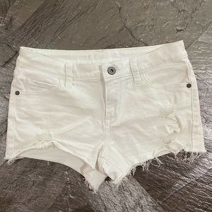 White distressed denim shorts
